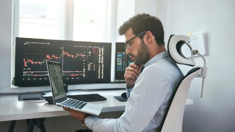 trader office with monitors